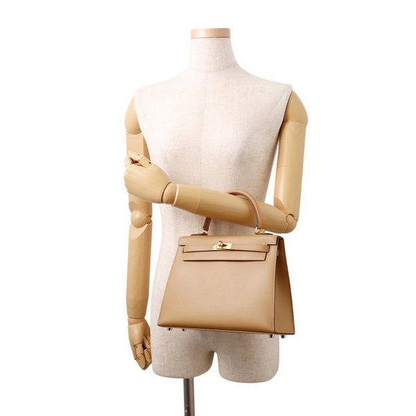 エルメス ハンドバッグ ケリー25 外縫い ヴェルソ ビスキュイ/ニューホワイト/ゴールド ヴォーマダム W刻印 ２wayショルダー