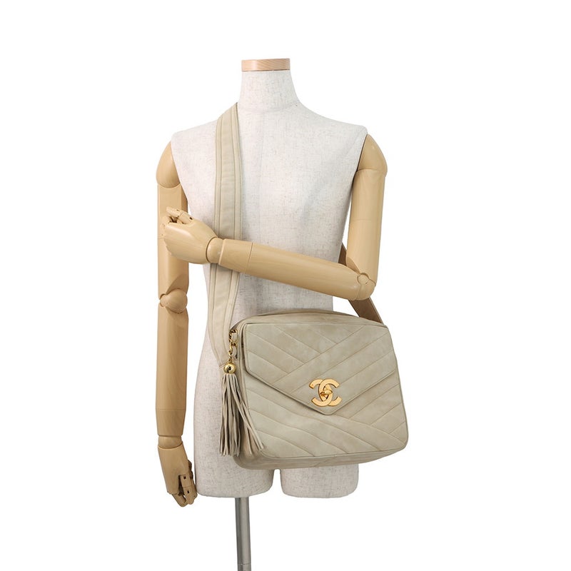 シャネル ショルダーバッグ バイアスステッチ ココマーク スエード CHANEL タッセル付き