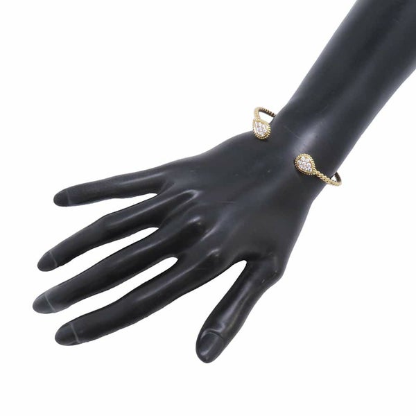 ブシュロン ブレスレット セルパンボエム ツイン モチーフ バングル ダイヤ 16P 計0.64ct K18YGイエローゴールド サイズ17 JBT00817