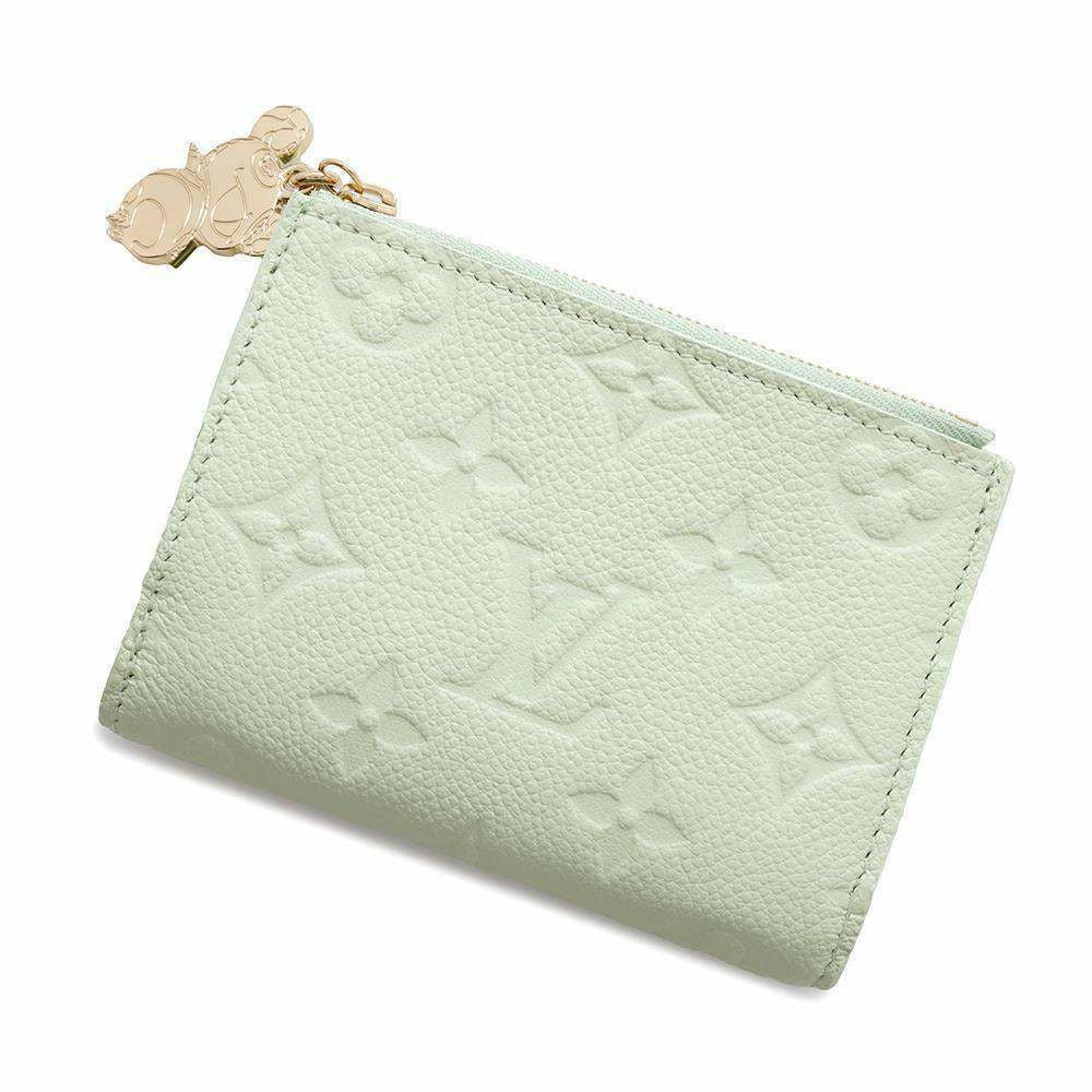 ルイヴィトン 二つ折り財布 モノグラム・アンプラント LV × TM