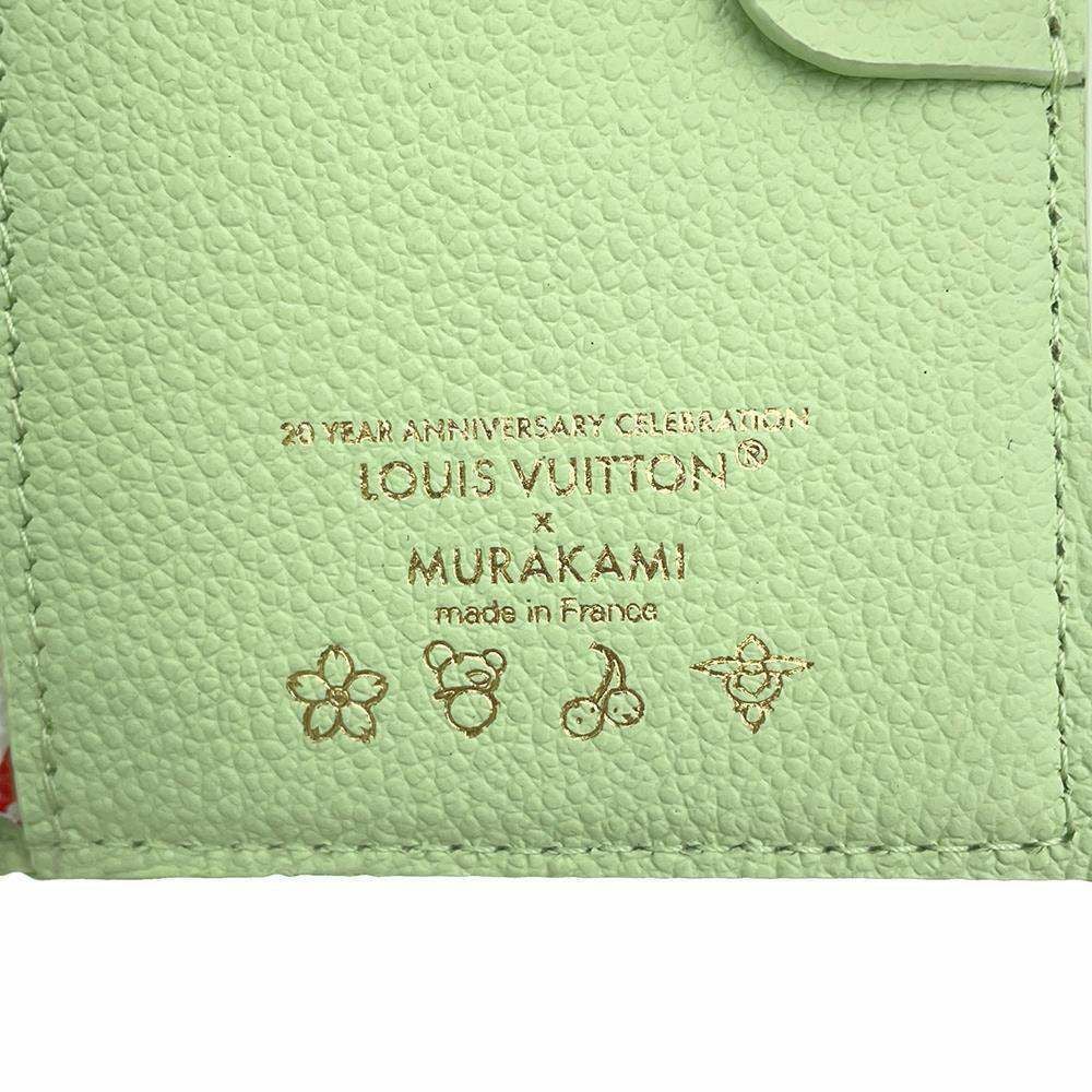 ルイヴィトン 二つ折り財布 モノグラム・アンプラント LV × TM