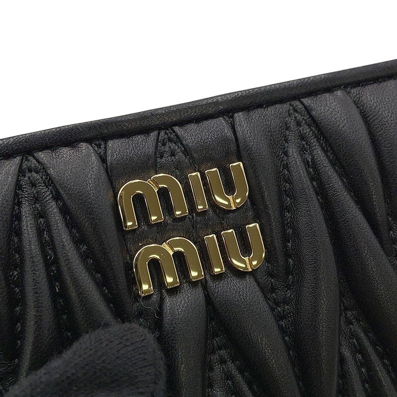 ミュウミュウ 二つ折り財布 マテラッセ ロゴ レザー 5ML075 Miu Miu 黒