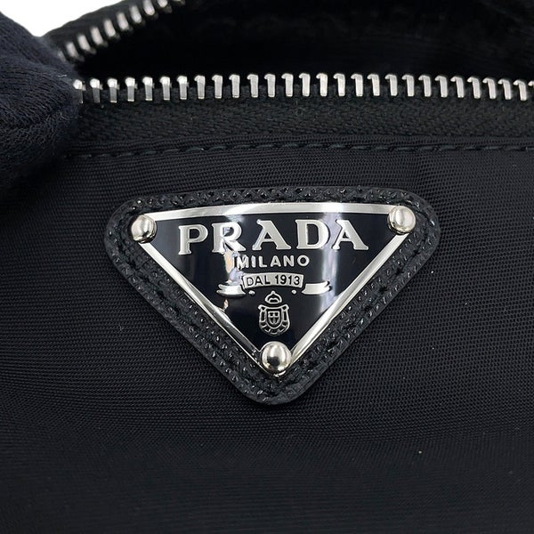 プラダ ポーチ Re-Nylon トライアングルロゴ リストバンドポーチ ナイロン 2TT095 PRADA ミニ ポーチ 黒