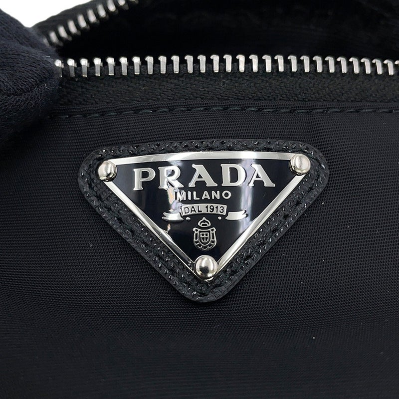 プラダ ポーチ Re-Nylon トライアングルロゴ リストバンドポーチ ナイロン 2TT095 PRADA ミニ ポーチ 黒