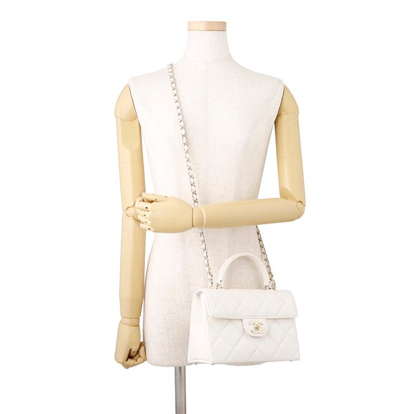 シャネル チェーンショルダーバッグ マトラッセ ココマーク トップハンドル ミニ フラップ キャビアスキン AS4711 CHANEL 白