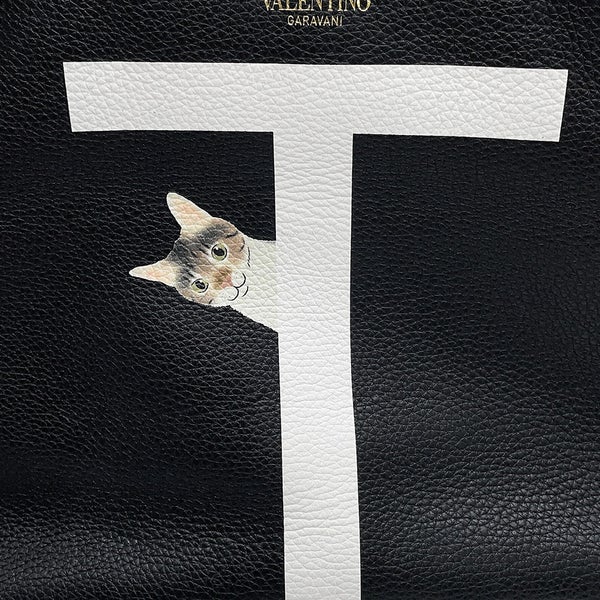 ヴァレンティノ・ガラヴァーニ トートバッグ ロックスタッズ ペット レザー VALENTINO リカルド・クシマノ 黒 白
