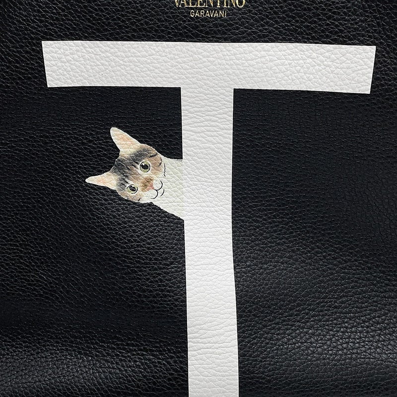 ヴァレンティノ・ガラヴァーニ トートバッグ ロックスタッズ ペット レザー VALENTINO リカルド・クシマノ 黒 白