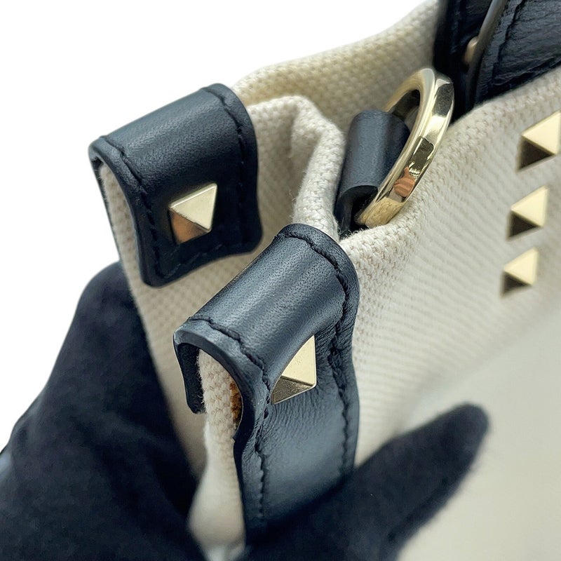 ヴァレンティノ・ガラヴァーニ ハンドバッグ VLTNロゴ ロックスタッズ キャンバス/レザー VALENTINO 黒