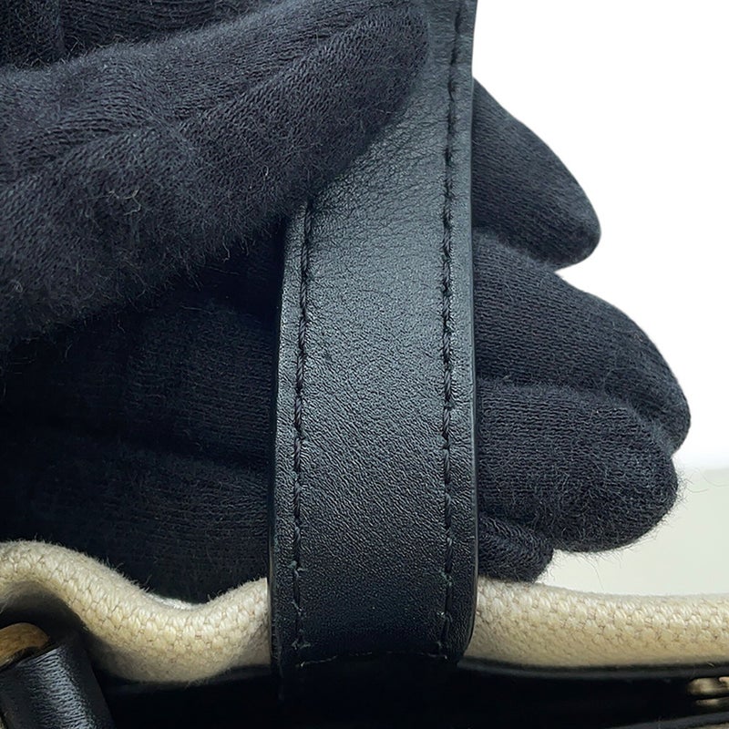 ヴァレンティノ・ガラヴァーニ ハンドバッグ VLTNロゴ ロックスタッズ キャンバス/レザー VALENTINO 黒