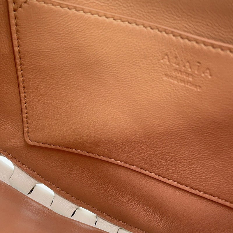 アライア チェーンショルダーバッグ ル・デミ・ルーン レザー AA1S00531CA138 ALAIA