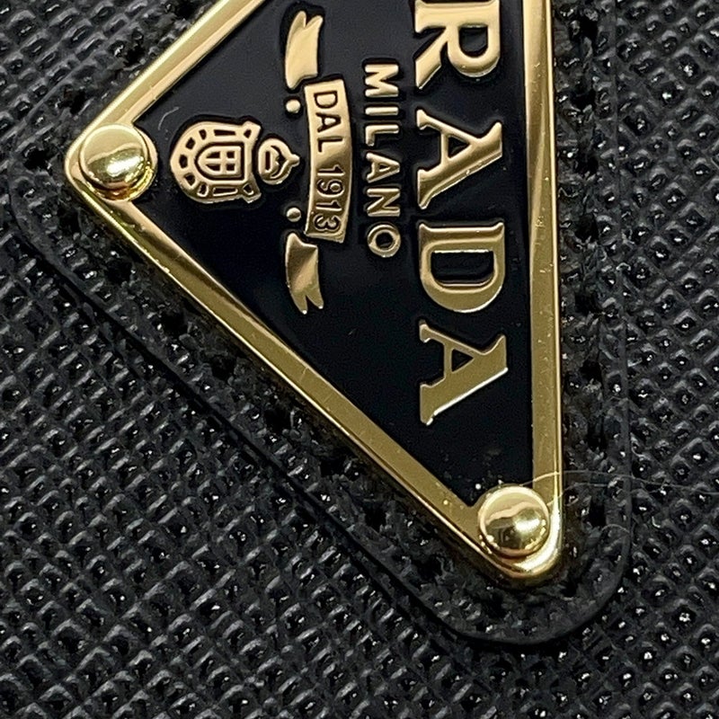 プラダ 二つ折り財布 トライアングルロゴ コンパクトウォレット リッププリント レザー 1ML050 PRADA 黒