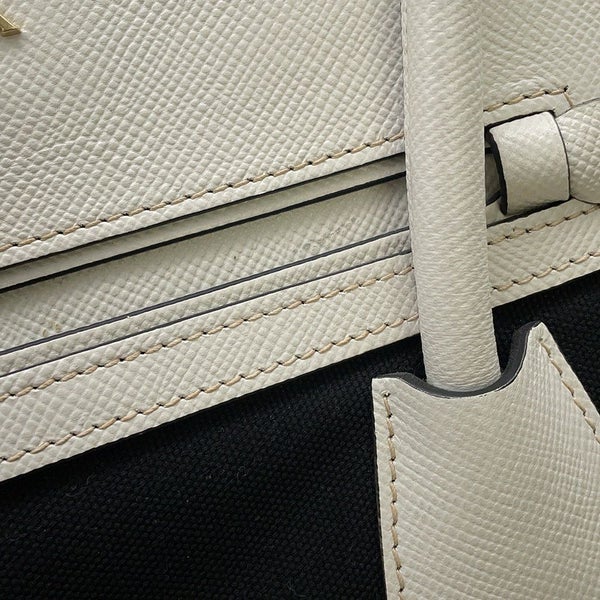 プラダ ハンドバッグ ロゴ サフィアーノ キャンバス BN2595 PRADA 2wayショルダー 黒 白