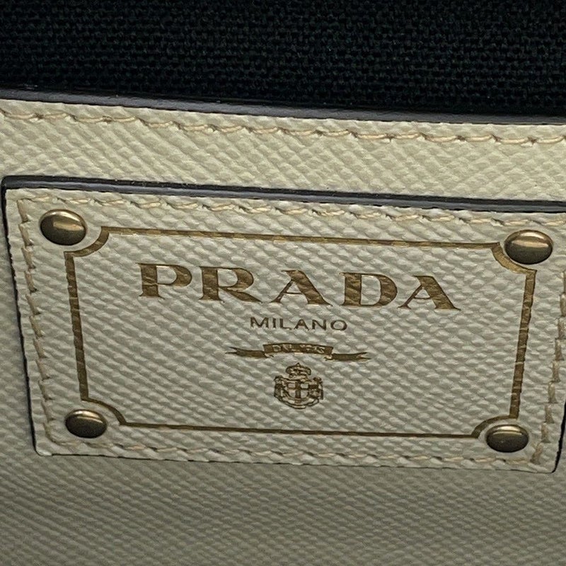 プラダ ハンドバッグ ロゴ サフィアーノ キャンバス BN2595 PRADA 2wayショルダー 黒 白