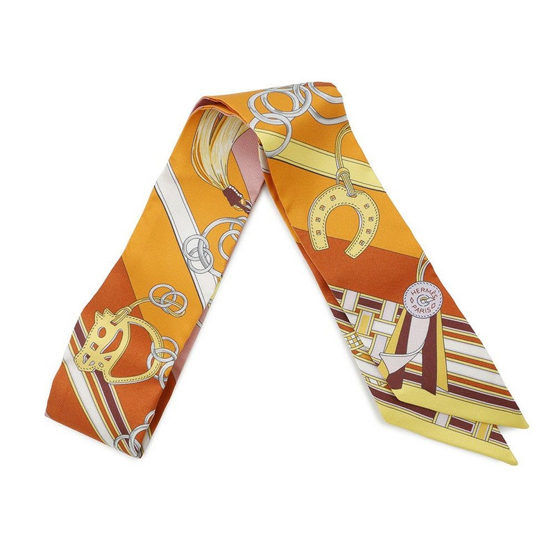 エルメス スカーフ ツイリー 馬勒とチャーム Brides et Gris-Gris HERMES シルクツイル 2023春夏