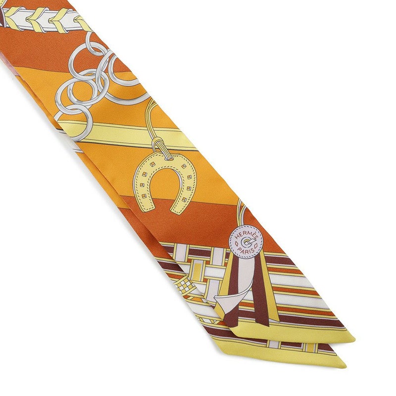 エルメス スカーフ ツイリー 馬勒とチャーム Brides et Gris-Gris HERMES シルクツイル 2023春夏