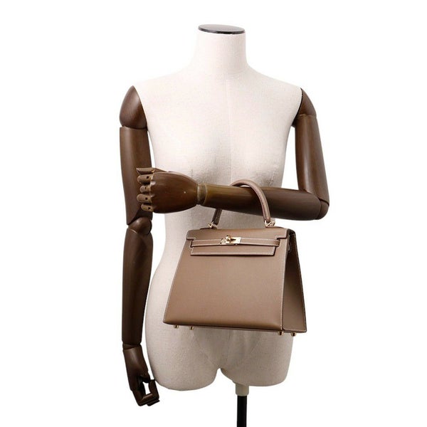 エルメス ハンドバッグ ケリー25 外縫い ヴェルソ エトゥープ/バンブー/シャンパンゴールド金具 ヴォ―マダム W刻印 2wayショルダー