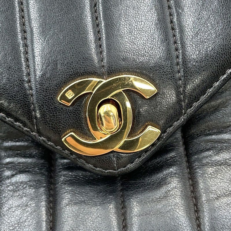 シャネル チェーンショルダーバッグ マドモアゼル ココマーク タッセルチャーム付き ラムスキン CHANEL 黒